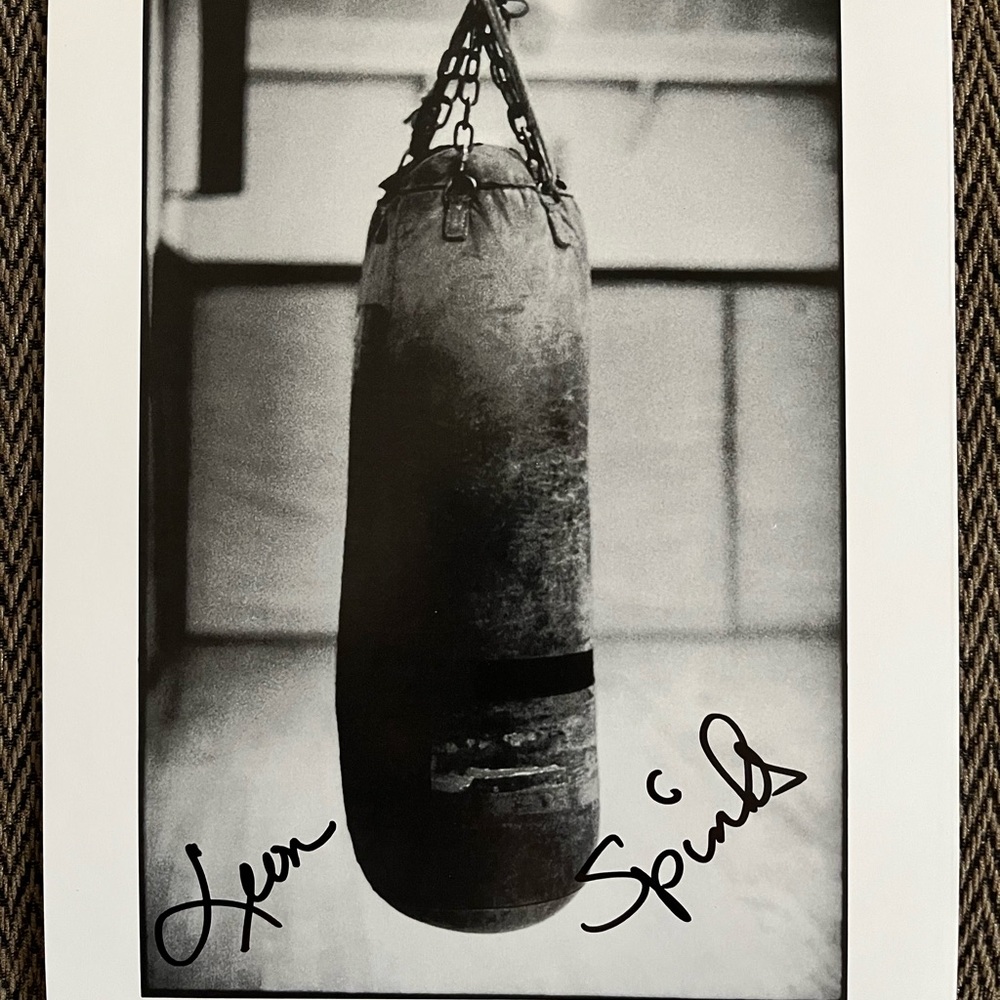 Leon Spinks signed 8x10 B&W Photo Heavy Bag